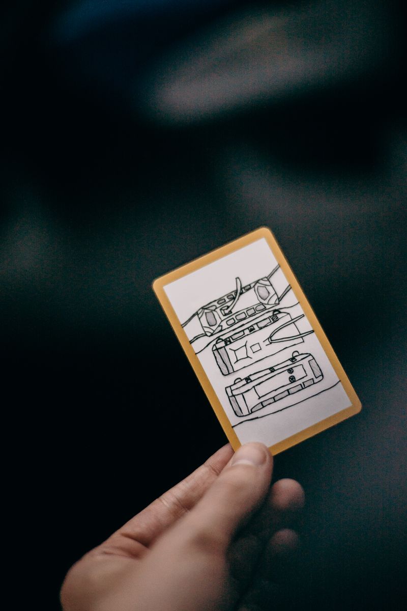 A smartphone showing a shared expense list with roommates' names and split amounts.